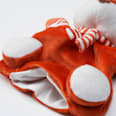 Handpuppe mit Rassel, orange PUSBLU