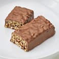 Baton proteic cu aromă de popcorn și caramel sărat, cu ciocolată cu maltitol Sportness
