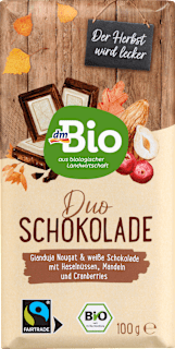 Ciocolată neagră nougat și ciocolată albă cu alune de pădure dmBio