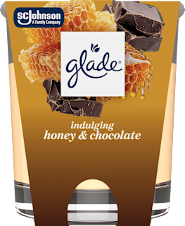 Duftkerze im Glas Indulging Honey & Chocolate 112 g glade