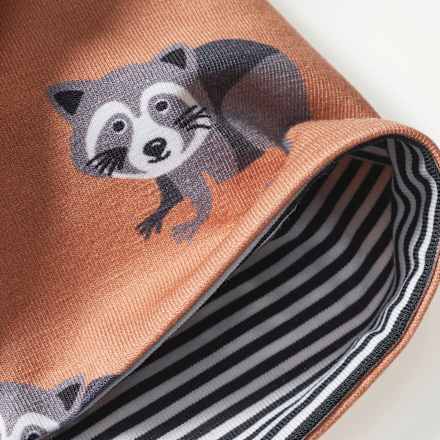 Mütze zum Wenden mit Waschbär-Muster, orange, Gr. 50/51 ALANA