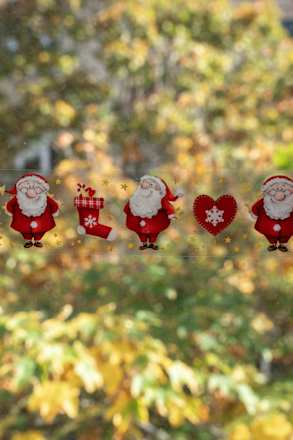 Fensterbild Weihnachtsmänner lang schmal  Dekorieren & Einrichten