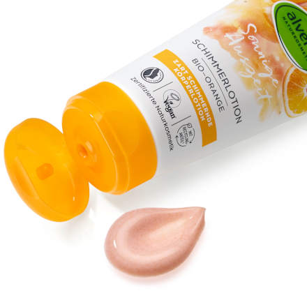 Losjon za telo z bleščicami Sonnige Auszeit z izvlečkom bio pomaranče alverde NATURKOSMETIK