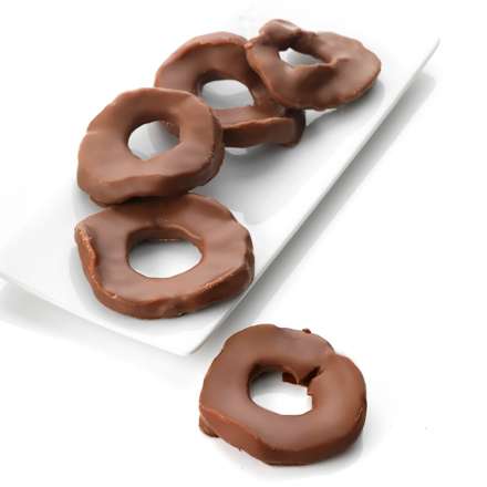 Anelli di mela essiccati ricoperti di cioccolato al latte dmBio