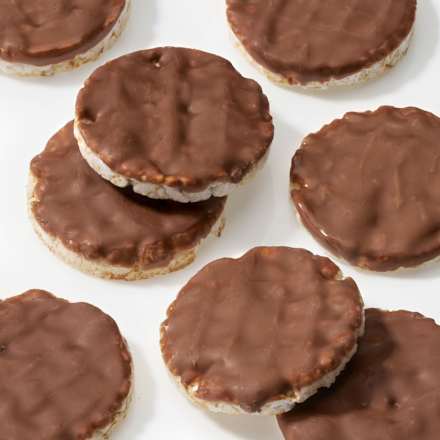 Bio mini puffasztott rizsszeletek tejcsokoládéval bevonva dmBio