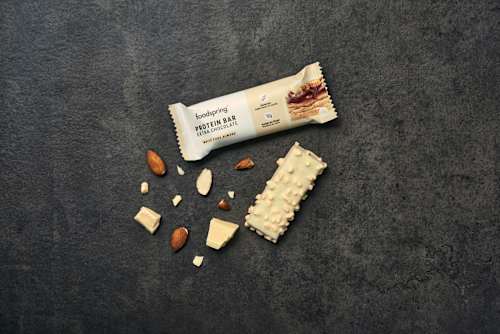 Proteinriegel Extra Chocolate, White Choc Almond foodspring