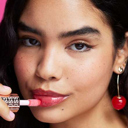 Pout Bomb gloss Cherry Sheer Red REVOLUTION