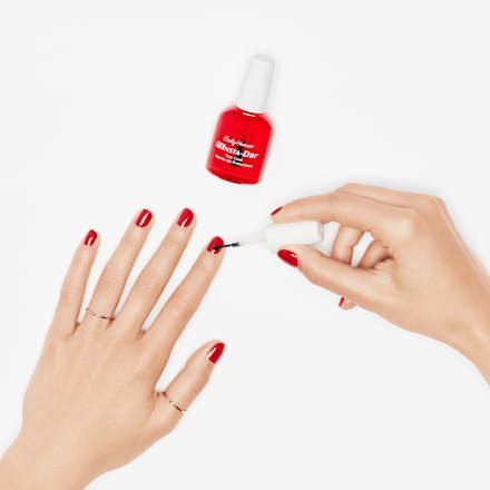 Fedőlakk Insta-Dri, gyorsan száradó Sally Hansen