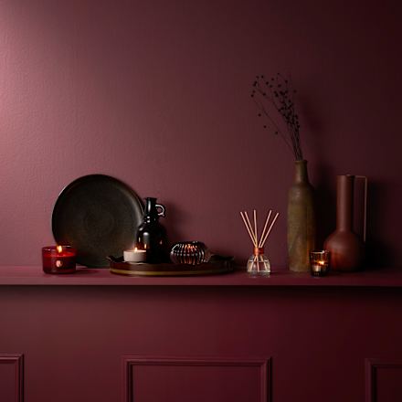 Duftkerze im Glas, True Glow, bordeaux Bolsius