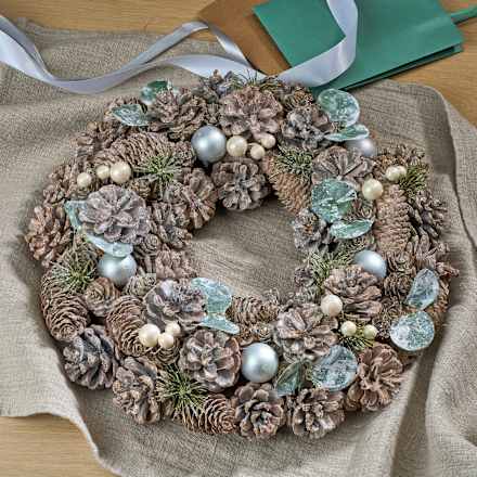 Kranz mit Zapfen, grün gefrostet Dekorieren & Einrichten
