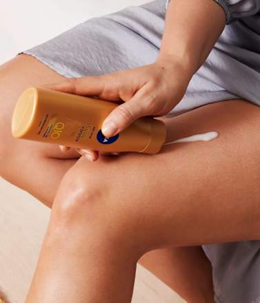Q10 Firming + bronze losion za zatezanje kože i preplanuli ten NIVEA
