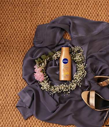Q10 Firming + bronze losion za zatezanje kože i preplanuli ten NIVEA