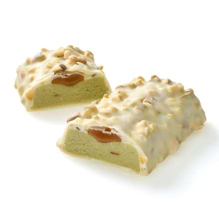 Baton proteic cu aromă de fistic caramel presărat cu fistic tocat, acoperit cu ciocolată albă maltitol Sportness