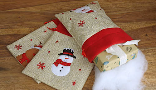 Geschenksack Jute mit rotem Fleece, Weihnachtsmann, Schneemann & Elch Dekorieren & Einrichten