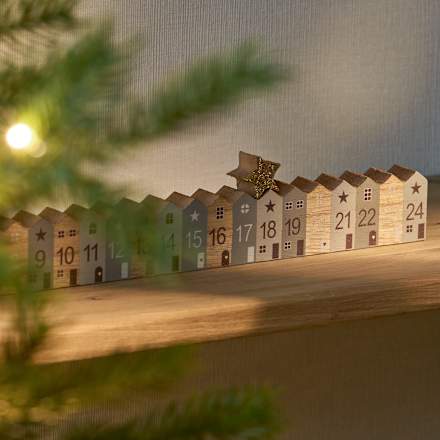 Adventscountdown Holzhäuserreihe mit Stern Dekorieren & Einrichten