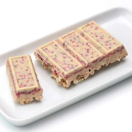 Schokoriegel, weiße Schokolade-Himbeere gepuffter Dinkel dmBio