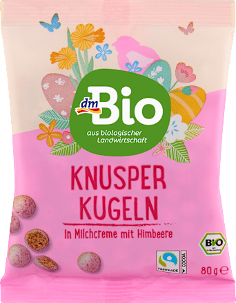 malinové křupavé kuličky v bílé čokoládě, kukuřičný extrudát dmBio