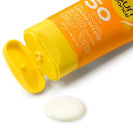 fluid na opalování obličej & dekolt SPF50 SUNDANCE